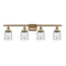 Bell Bath Vanity Light shown in the Brushed Brass finish with a Clear shade