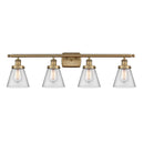 Cone Bath Vanity Light shown in the Brushed Brass finish with a Clear shade