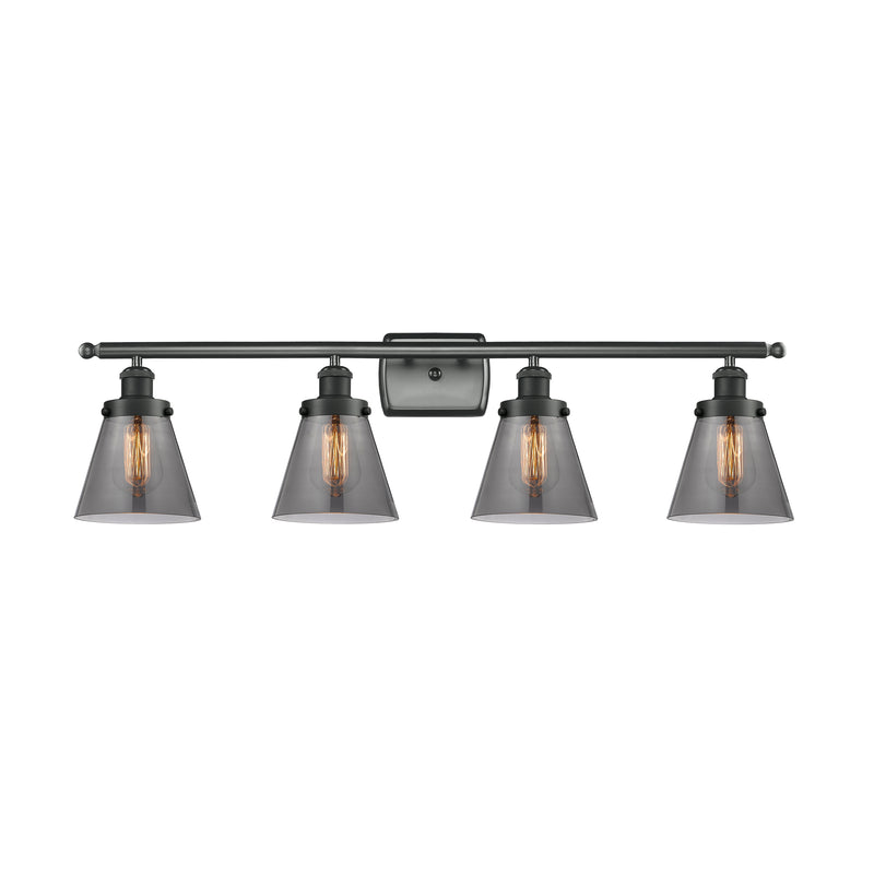 Cone Bath Vanity Light shown in the Matte Black finish with a Plated Smoke shade