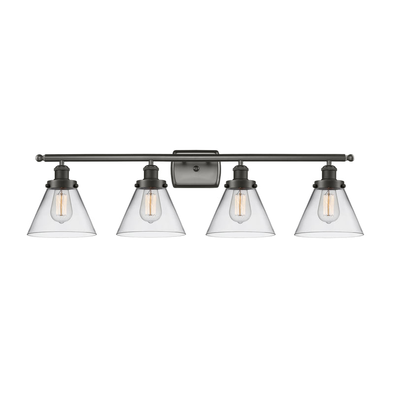 Cone Bath Vanity Light shown in the Oil Rubbed Bronze finish with a Clear shade