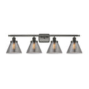 Cone Bath Vanity Light shown in the Oil Rubbed Bronze finish with a Plated Smoke shade