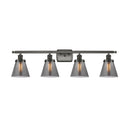 Cone Bath Vanity Light shown in the Oil Rubbed Bronze finish with a Plated Smoke shade