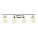 Beacon Bath Vanity Light shown in the Polished Nickel finish with a Matte White shade